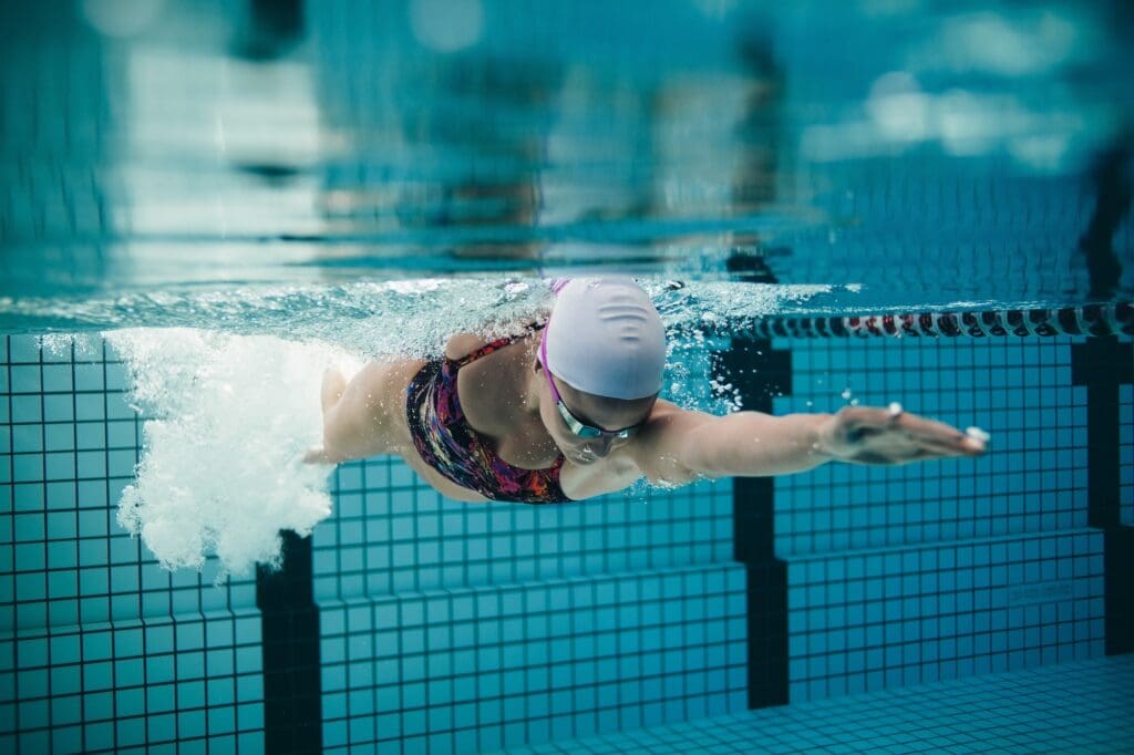 Female athlete swimming in pool